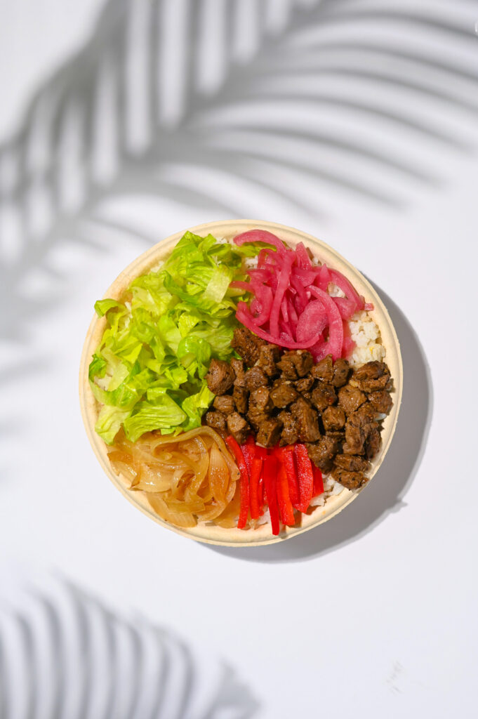 Palm leaf shadows and healthy food bowls on white background 